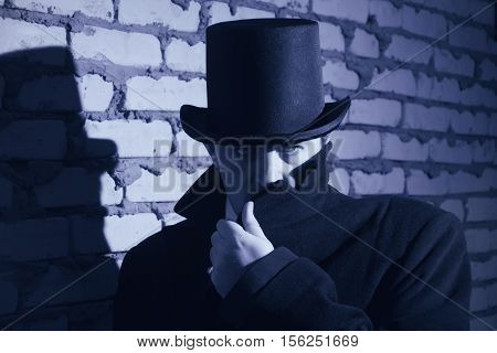 Victorian Man In The Black Coat, Top Hat And In A Tie