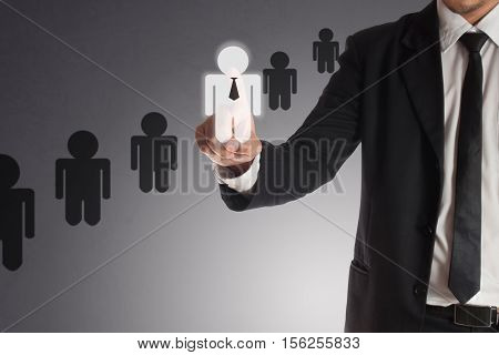 businessman choosing right partner from many candidates Concept of teamwork.