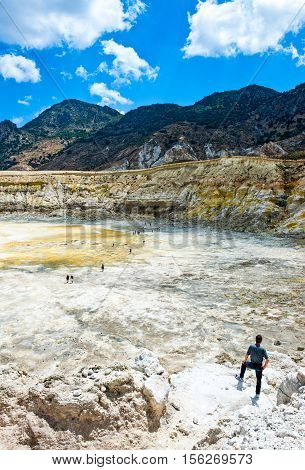 Nissyros Greece - May 17 2010: Tourists in the volcano's caldera
