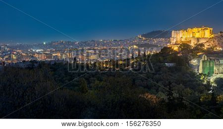 Parthenon and Herodium construction in Acropolis Hill in Athens, Greece shot in blue hour