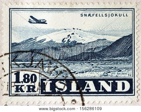 LUGA RUSSIA - NOVEMBER 6 2016: A stamp printed by ICELAND shows view of Saefellsjokull - a stratovolcano with a glacier covering its summit in western Iceland circa 1952