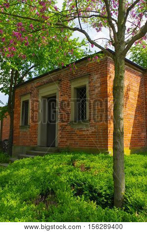 a old brick house in a park of Wilhelma zoo Stuttgart Germany.