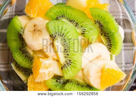 Delicious fruit salad in a glass bowl for diet