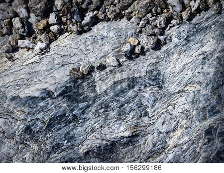 abstract background or texture small pebbles on a rock mica