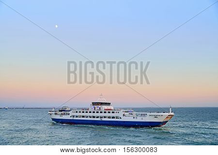 Floating On The Sea Ferry At Sunset