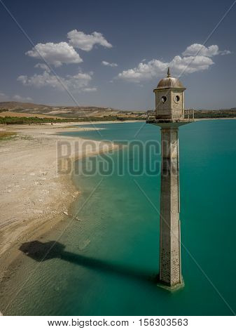 View of the tower at the dam over Rio Alhama Andalucia Southern Spain