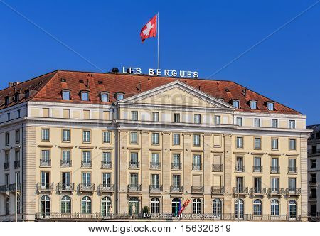 Geneva Switzerland - 24 September 2016: facade of the Four Seasons Hotel des Bergues building. The luxurious Hotel des Bergues has been a landmark on Lake Geneva since 1834.