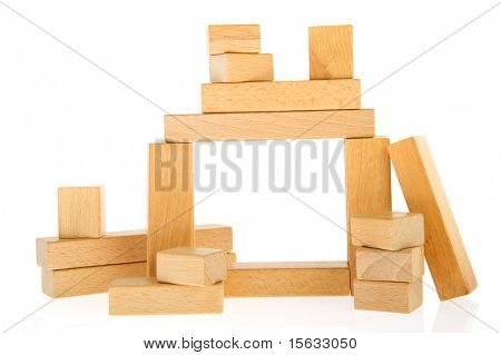 Building from wooden blocs isolated over white