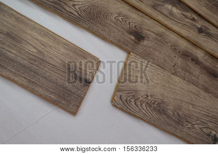 laying laminate flooring and dark wood colors - floor laying