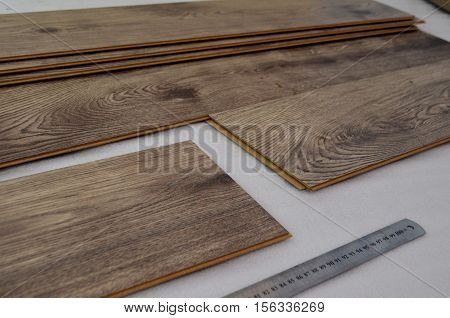 laying laminate flooring and dark wood colors - floor laying