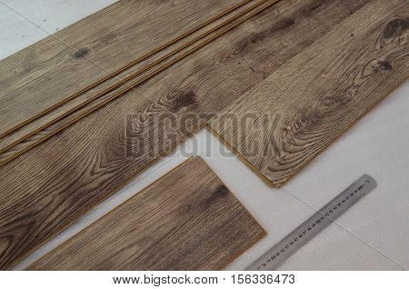 laying laminate flooring and dark wood colors - floor laying