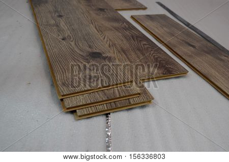 laying laminate flooring and dark wood colors - floor laying