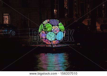 Amsterdam Netherlands - December 18 2015: Light Festival Amsterdam promotional ball for the Twente region in eastern Netherlands.