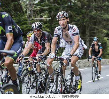 Col du Tourmalet France - July 242014: The German cyclist Jens Voigt of Team Trek Factory Racing climbing in the packthe difficult road to Col du Tourmalet in Pyrenees Mountains during the stage 18 of Le Tour de France 2014.