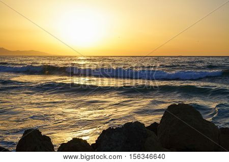 Sea wave close up, low angle view, sunrsie shot