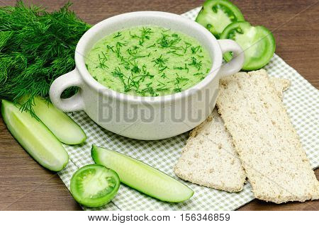green soup puree of fresh vegetables. concept of healthy food
