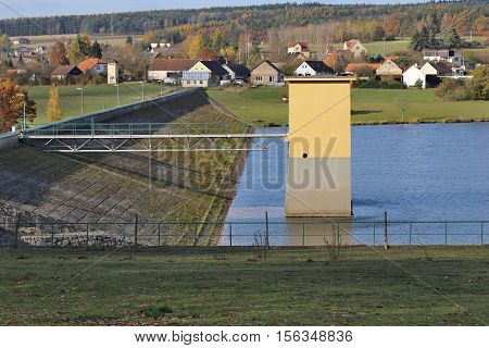 water dam in the autumn nature .