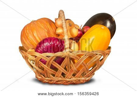 Wicker basket filled with various ripe vegetables