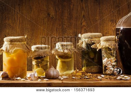 Mouse in basement with stockpiles on old wooden table