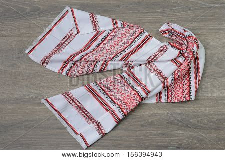 Traditional ethnic slavian towel on wooden table