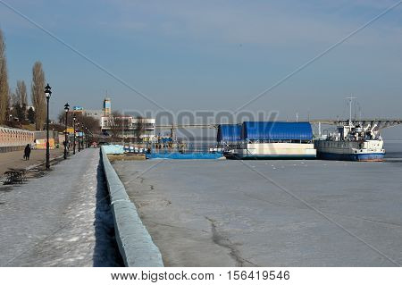 River pier in the early spring. Volga river.