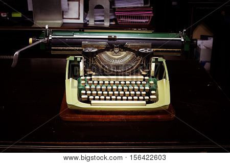 Ancient typewriter on the table in vintage