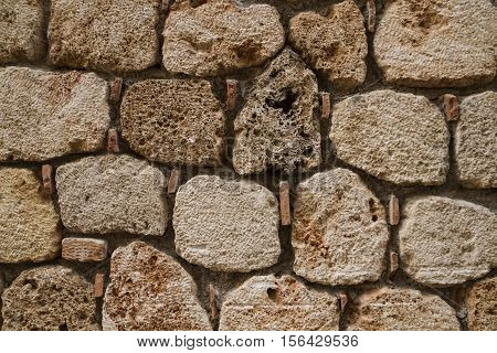 large stone wall in the old town