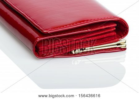 shiny red wallet on a white background