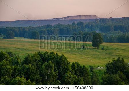 thick morning fog in the summer forest. thick morning fog in the forest at pond. Morning landscape in summer thick fog. dense fog in the morning.  early morning. forest hiding in the fog.