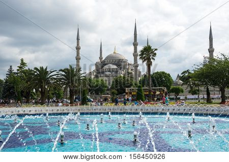 ISTANBUL TURKEY - JUNE 19 2015: Sultan Ahmet Mosque (Turkish: Sultan Ahmet Camii) is a historic mosque in Istanbul Turkey. The mosque is popularly known as the Blue Mosque for the blue tiles adorning the walls of its interior