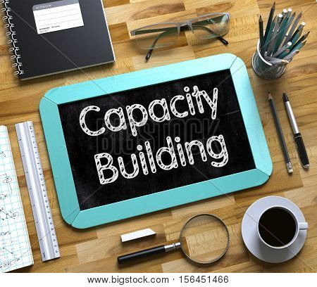 Capacity Building Handwritten on Small Chalkboard. Small Chalkboard with Capacity Building. 3d Rendering.