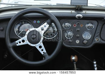 a Dashboard of a vintage sports car