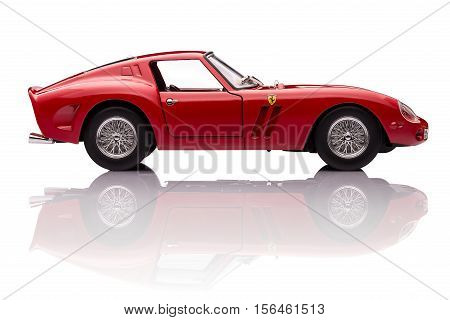 KRIVOY ROG, UKRAINE - OCT 29 - Toy Ferrari 250 GTO on background. Photo made in the studio, Saturday 29 October 2016