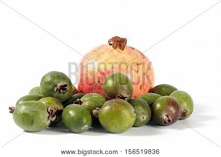 Fresh ripe pomegranate and pineapple guava fruit tropics