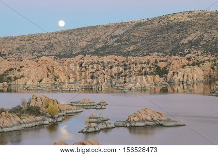 the supermoon rising over scenic Watson Lake Prescott Arizona