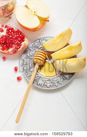 Apples, pomegranate and honey for Rosh Hashanah .