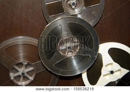 Rare reel to tape recorder. Vintage bobine with the music. Nineteenth - twentieth century - most popular medium of recorded music. Historical analog media sound information for gramophones.