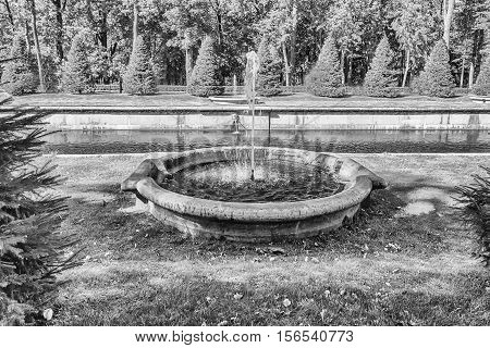 Small Foutain Along The Sea Channel In Peterhof Gardens, Russia