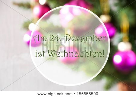 German Text Am 24. Dezember Ist Weihnachten Means December 24th Is Christmas Eve. Christmas Tree With Rose Quartz Balls. Close Up Or Macro View. Christmas Card For Seasons Greetings.
