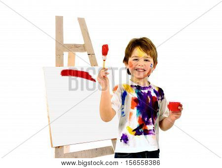 Happy messy little artist isolated on white