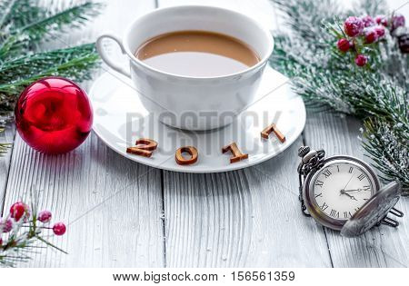 cup of coffee and new view on wooden bacgkround