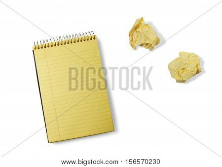Still Life of a Pad of Yellow Notepad and Crumpled Paper Wads on White Background