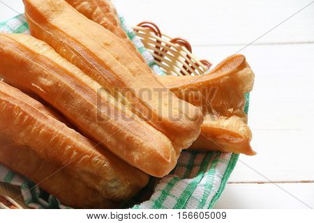 Chinese traditional Fried bread stick or popular known as You Tiao normally eaten with rice porridge or spread with butter and coconut jam
