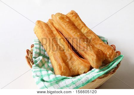 Chinese traditional Fried bread stick or popularly known as You Tiao normally eaten with rice porridge or spread with butter and coconut jam