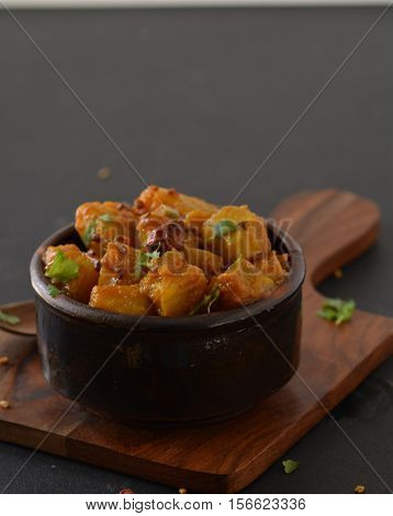 Indian style sweet and sour Yellow pumpkin curry