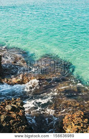 Natural rocks and turquoise clear sea waters at Kleopatra beach, Alanya, Turkey, Mediterranean coast