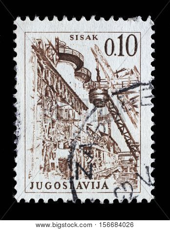 ZAGREB, CROATIA - JUNE 14: Stamp printed in Yugoslavia shows a Steel Plant, Sisak, with the same inscription, from series 