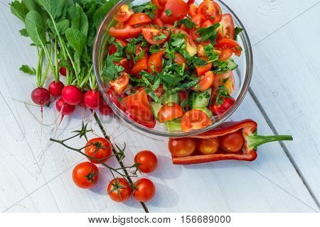 Fresh Vegetables In Sunny Garden On Old Plank