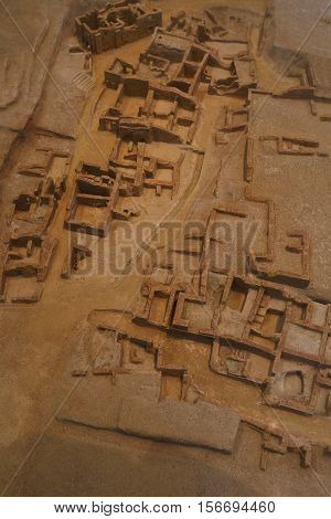 FIRA, GREECE - NOVEMBER 06, 2016: Museum of Prehistoric Thera in Fira, Santorini. Model of excavated part of the city on November 06, 2016.