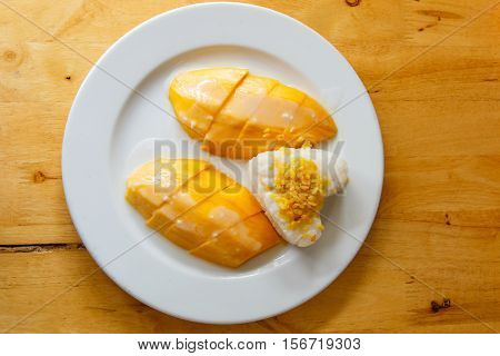 Thai style tropical dessert glutinous rice eat with mangoes